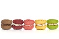 Row of Colorful Cream Cookies Isolated on White