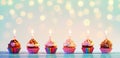 Row Of Colorful Cupcake With Candles Royalty Free Stock Photo