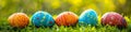A row of colorful easter eggs are lined up in the grass, AI Royalty Free Stock Photo