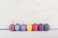 row colorful eggs wood. High quality photo