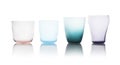 Row of colorful empty glasses on white Royalty Free Stock Photo