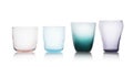 Row of colorful empty glasses on white Royalty Free Stock Photo