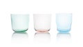 Row of colorful empty glasses on white Royalty Free Stock Photo