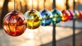 row of colorful glass balls hanging from string Royalty Free Stock Photo