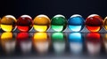 A row of colorful glass balls are lined up on a table, AI Royalty Free Stock Photo