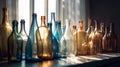 Row of colorful glass bottles on window sill. Vintage multicolored bottles in rays of sun. Generative AI Royalty Free Stock Photo