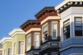 Row of colorful historic buildings with bay windows in San Franc