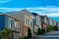 Row of colorful houses in the historic districts of downtown san francisco california in midday shade partly cloudy sky Royalty Free Stock Photo