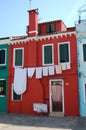 Row of colorful houses on the island of Burano Royalty Free Stock Photo