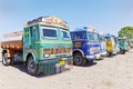 Row of colorful Indian trucks parked at a Dhabh