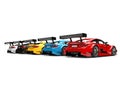 Row of colorful modern super race cars - back view Royalty Free Stock Photo
