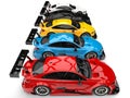 Row of colorful modern super race cars - top down side view