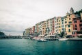 Row of colorful multicolored buildings houses of Portovenere coastal town village and boats in harbor of Ligurian sea, Riviera di Royalty Free Stock Photo