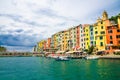 Row of colorful multicolored buildings houses of Portovenere coastal town village and boats in harbor of Ligurian sea, Riviera di Royalty Free Stock Photo