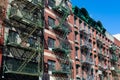 Colorful Old Buildings with Fire Escapes on the Lower East Side of New York City Royalty Free Stock Photo