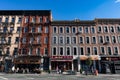 Row of Colorful Old Buildings with Fire Escapes on the Upper East Side of New York City