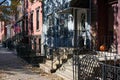 Sidewalk and Row of Colorful Old Homes in Greenpoint Brooklyn New York Royalty Free Stock Photo