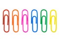 Row of colorful paper clips isolated on white background. Royalty Free Stock Photo