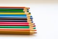 Row of colorful pencils are lying on white background. Preparing to school, university, college Royalty Free Stock Photo