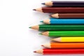 Row of colorful pencils rainbow order on white background Royalty Free Stock Photo