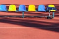 Row of colorful plastic seats. Sports and disabilities. Royalty Free Stock Photo