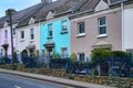 Row of colorful stucco townhouses