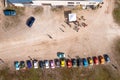 row of colorful stylish vintage Fiat 126 PanCars rental cars, aerial drone view Royalty Free Stock Photo