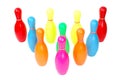 Row of colorful toy plastic bowling pins
