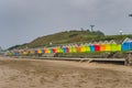 Row of Colourful Beach Huts on a Rainy Autumn Day Royalty Free Stock Photo