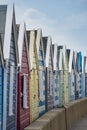 A Row of Colourful Beach Huts Royalty Free Stock Photo