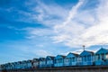 Row of Colourful Beach Huts Royalty Free Stock Photo