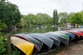 A row of colourful boats that can be hired to use on the lake. Finsbury Park Royalty Free Stock Photo