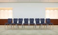 Row of comfortable chairs in waiting room Royalty Free Stock Photo