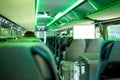 Row of comfortable seats inside a modern tourist bus Royalty Free Stock Photo