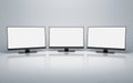 Row of computer monitors with white blank screens. clipping path. 3d Royalty Free Stock Photo