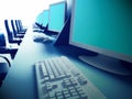 Row of computers on desk Royalty Free Stock Photo