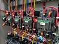 A row of contactors in low voltage switchboard.