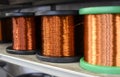 Row of copper wire coils in close up view Royalty Free Stock Photo