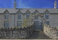Row of cottages with stone archway at the top of steps Royalty Free Stock Photo