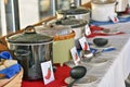 Row of crock pots in chili cook off contest Royalty Free Stock Photo