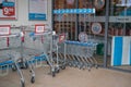 Row of customer shopping trolley carts for Hoogvliet shop entrance