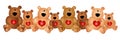 Row of Cute Teddy Bears With Hearts Royalty Free Stock Photo