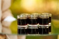 Row of Dark Shots in Clear Glasses Royalty Free Stock Photo