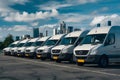 Row of delivery vans signifies efficient freight transportation network