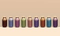 A Row of Different Color Burning Floral Jar Candle Set on Peach