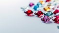Row of Different Colored Diamonds on White Surface Royalty Free Stock Photo