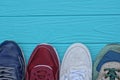 a row of different four sports colored sneakers Royalty Free Stock Photo