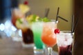 Row of different fresh alcoholic cocktails Royalty Free Stock Photo