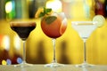Row of different fresh alcoholic cocktails on bar Royalty Free Stock Photo