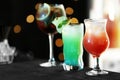 Row of different fresh alcoholic cocktails on counter Royalty Free Stock Photo